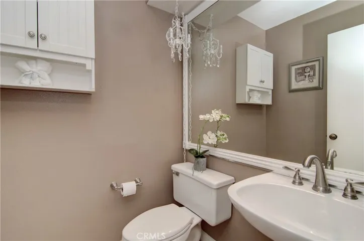Main floor guest bath is convenient, yet tucked away for privacy...