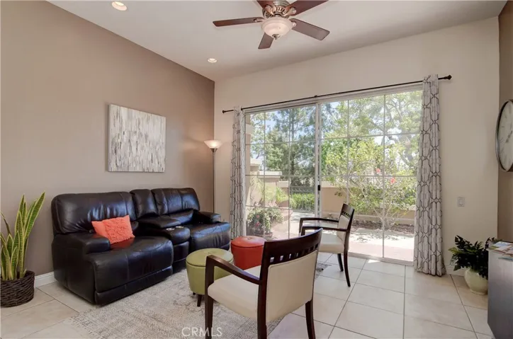 Another cool space to hang...and another slider to the patio...this could also be a huge dining room for large holdiday meals.