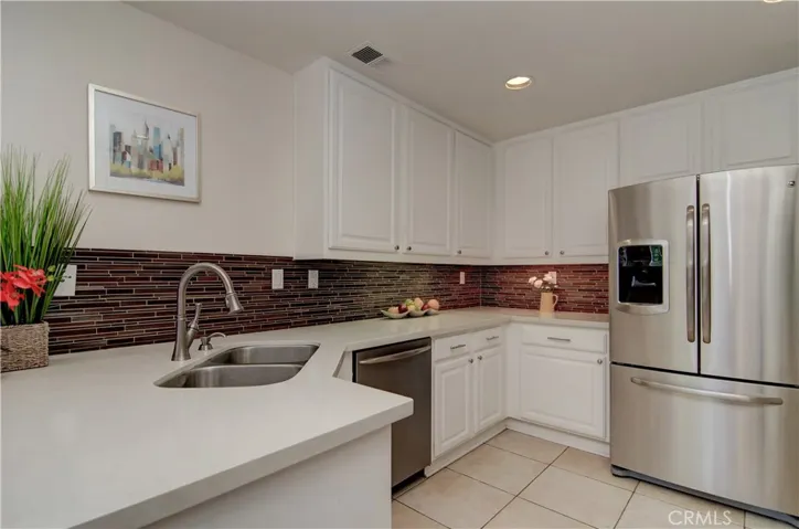 Check out the wonderful details here...loads of cabinetry, counter space...and high end stainless appliances.