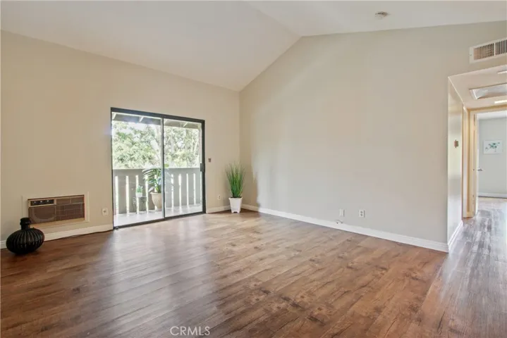 Easy indoor/outdoor living with balcony off the living room.
