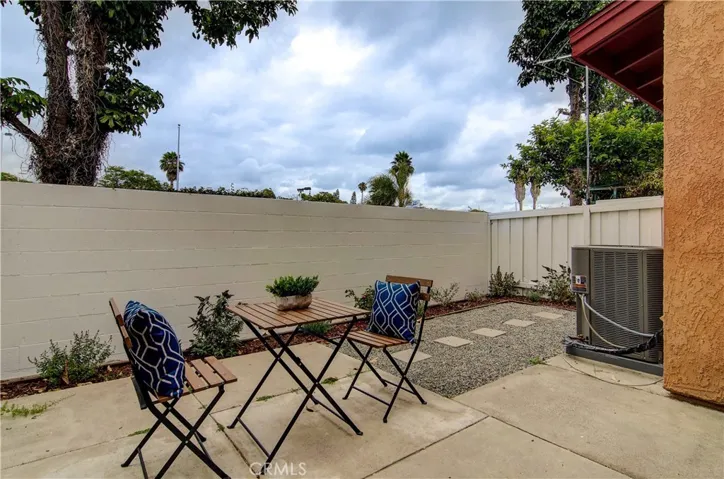 Sunny, private patio is low maintenance too!