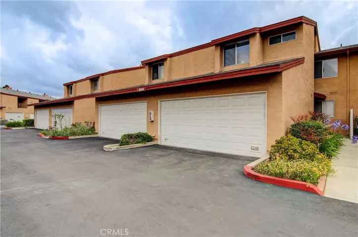 Inviting, landscaped walkway makes a nice "welcome home."