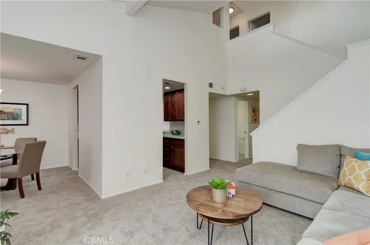 Love the high ceiling and the flowing floor plan provides for easy transition between spaces.