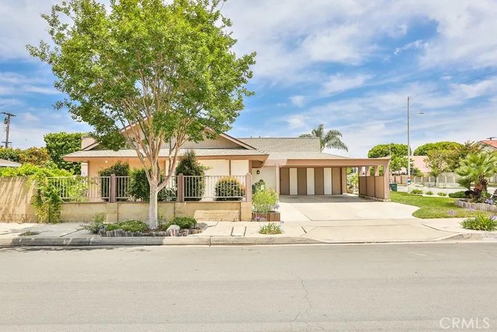 Huge corner lot with parking for 6 cars and an RV!