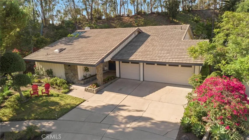 Welcome home at 2349 Camino Rey tucked against the Fullerton Trails