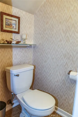 The other portion of the downstairs 1/2 bath