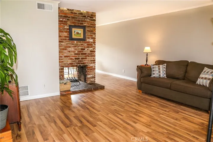 Another shot of the living room, looking at the 2 sided fireplace