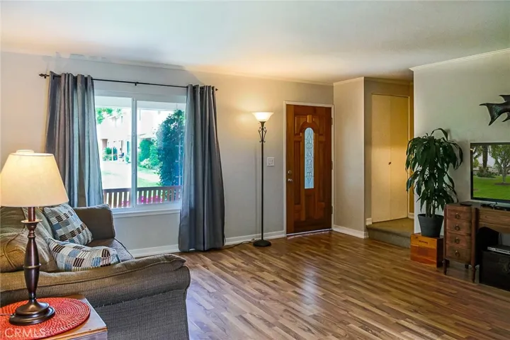 Living room. You have a view of the Green belt out your front window