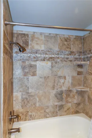 Nice tile finish around master tub/shower!!
