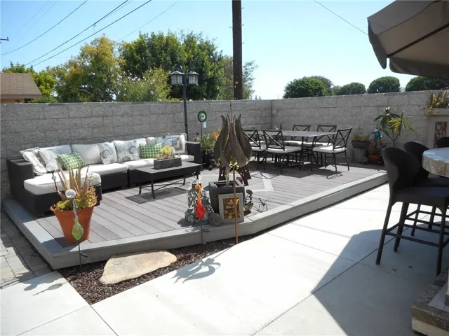 West Patio with Trex Deck and Concrete Patio Area