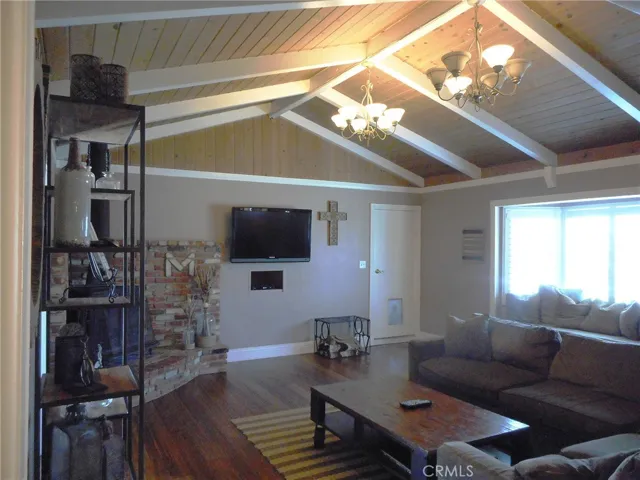 Open Beam Family room with Bamboo Flooring and Direct Access to the 2 Car Garage