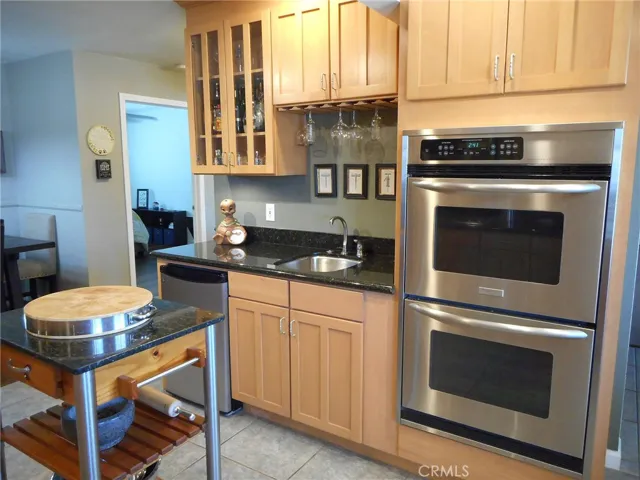 Double Stainless Oven, Stainless and Granite Wet Bar and second Refridgerator