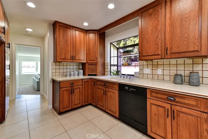 Lots of cabinet and counter space.  Durable countertops and pull out shelves in most of the lower cabinets.  Note the "appliance garage" in the corner (shown partially open).