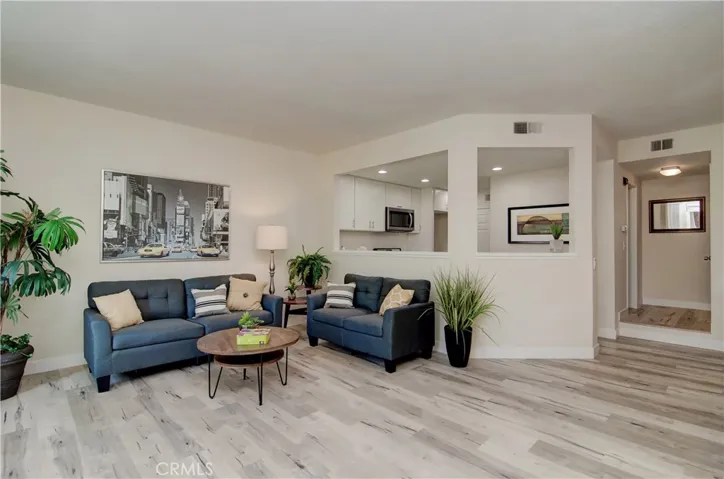 Nobody feels left out here... All of the action from the kitchen can still be seen from this living room.