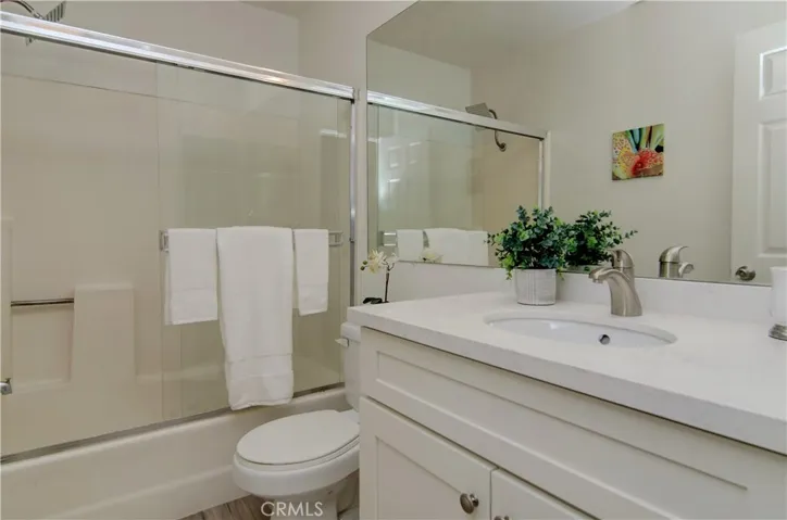 New vanity, new flooring, new hardware, and all new fixtures in this bathroom.