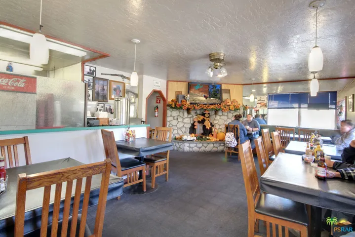 West dining area and fireplace