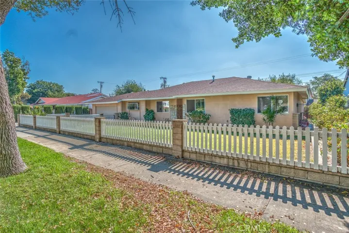 Large yard, new wood fencing, nice curb appeal.