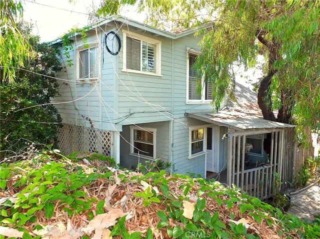 A Unique Triplex on a More Than Double Size Lot! Perfect In Old Towne Neighborhood of Seal Beach