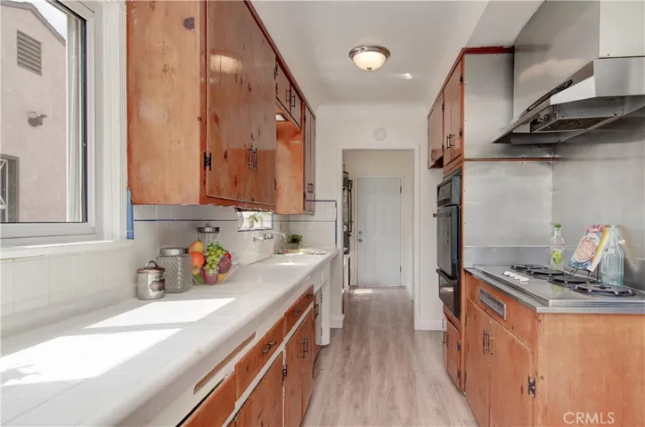 Plenty of cabinets and prep space will keep any cook happy in this kitchen.