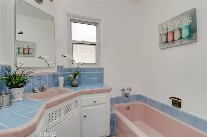 Good counter space and vanity storage here.