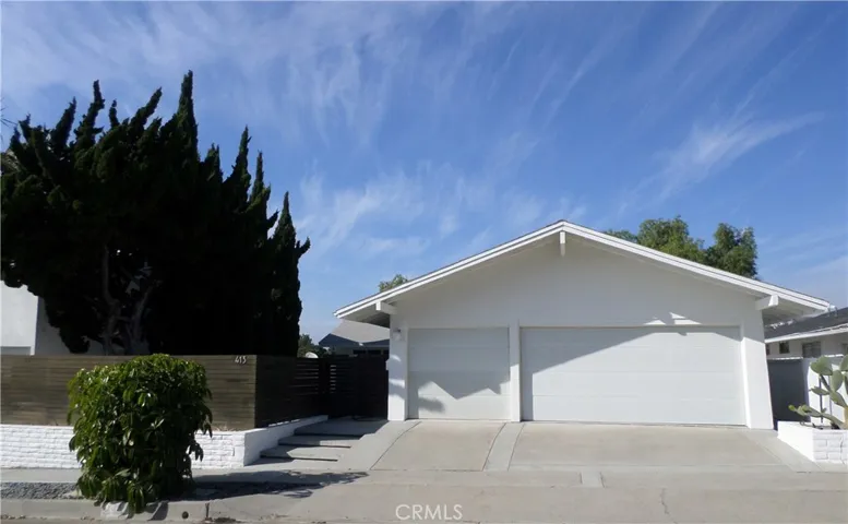 Mid-century modern gated entrance.