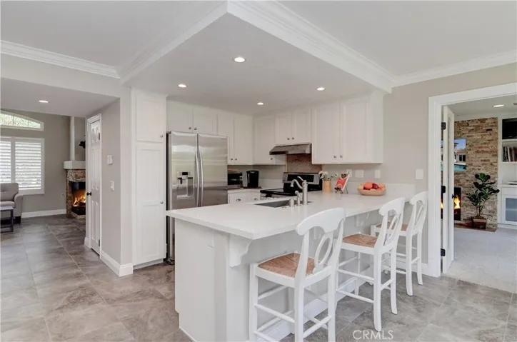 This is the hub of the home for sure...with easy transition between all living areas and back yard.