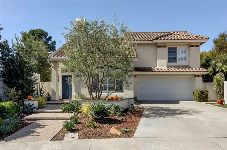 Deep set back from the street and water wise landscape offer great street appeal.