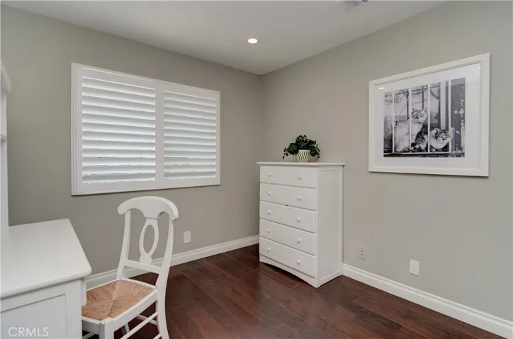 Nice upgrades include plantation shutters, recessed lighting and new moldings.