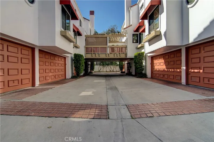 Motor court gives easy access to oversize two car garage.