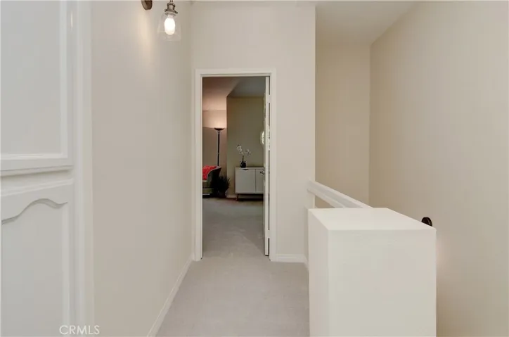 Upper gallery allows for easy transiton between spaces and privacy between the two master suites.
