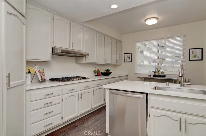 This kitchen is ready to go...new quartz counters, stainless appliances and fixtures and soooo much space.