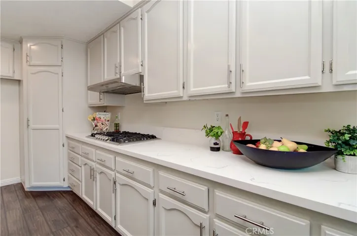 Cabinets galore...even a corner pantry for those large items.