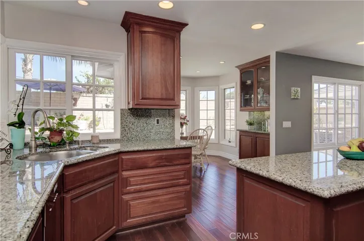 Kitchen sink has window with view to rear yard.