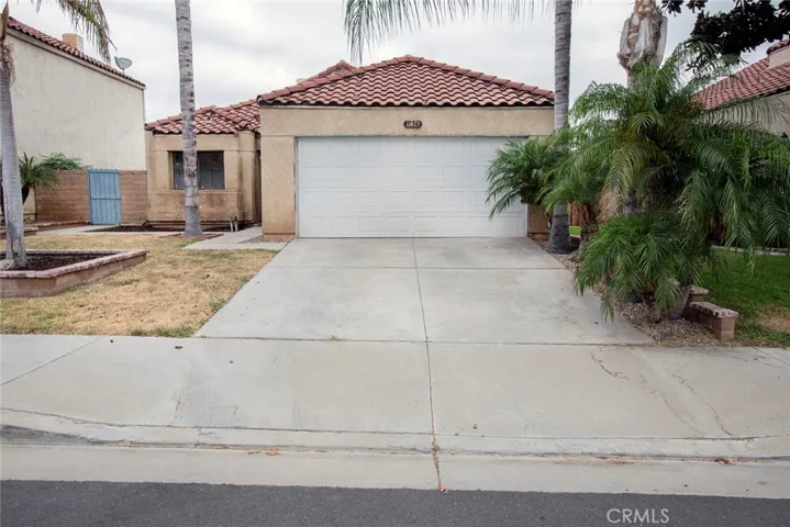 Street view, 2-car garage with parking for 2 cars in driveway