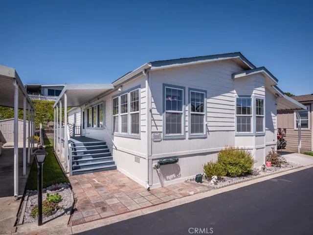 Beautiful and immaculate home on a permanent foundation, (lot is included).  Covered front porch, nice fenced yard, 30 year dimensional comp roof, dual pane windows and so much more.