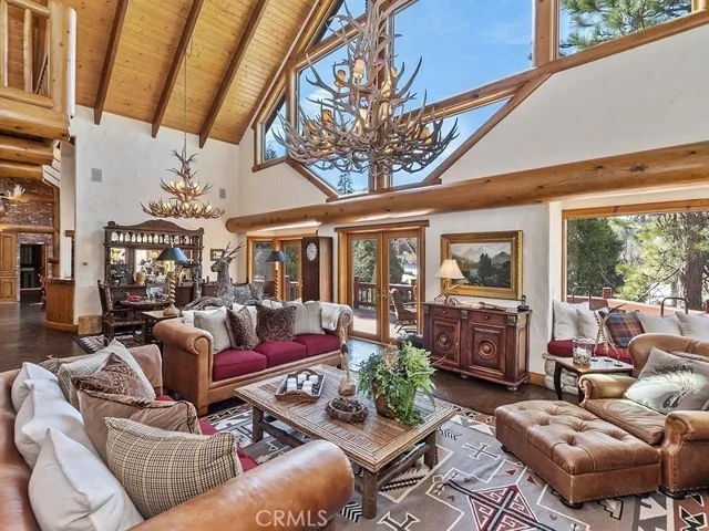 Mountain lodge feel with large antler chandeliers