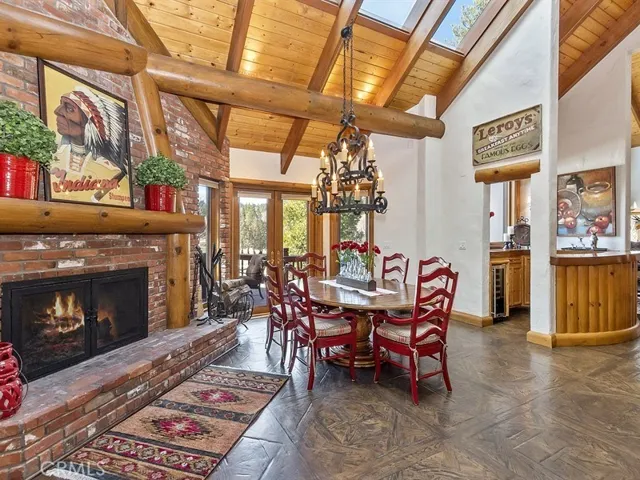 Spacious family kitchen with eating area and cozy fireplace