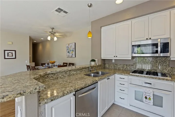 Granite countertops offer plenty of prep space