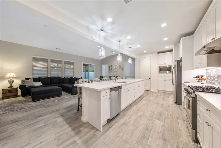UPGRADES and MORE UPGRADES Huge great room featuring a huge center island