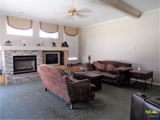 Expansive Living Room Has Cathedral Ceil