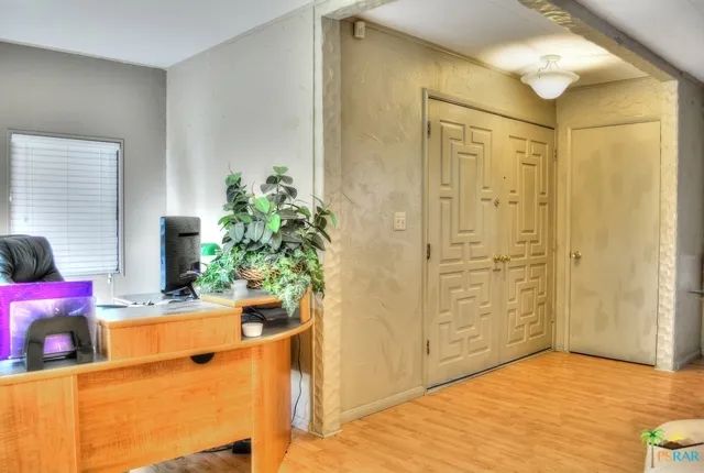 View of Front Double Door  & Den!
