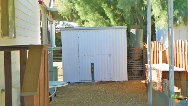 Storage Shed Included On Property
