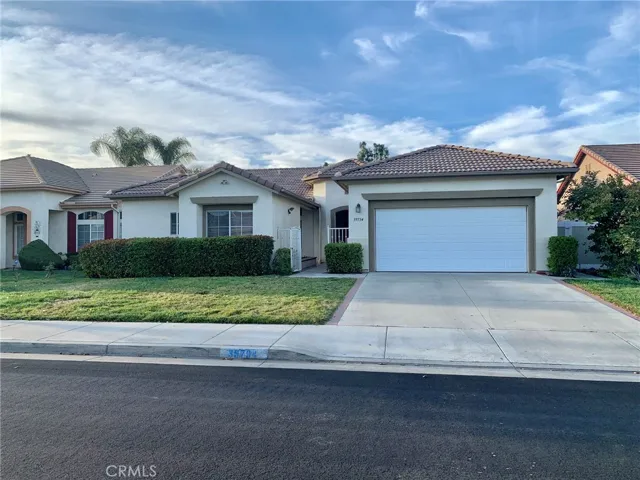 Casita is the structure to the left of the front walkway gate.