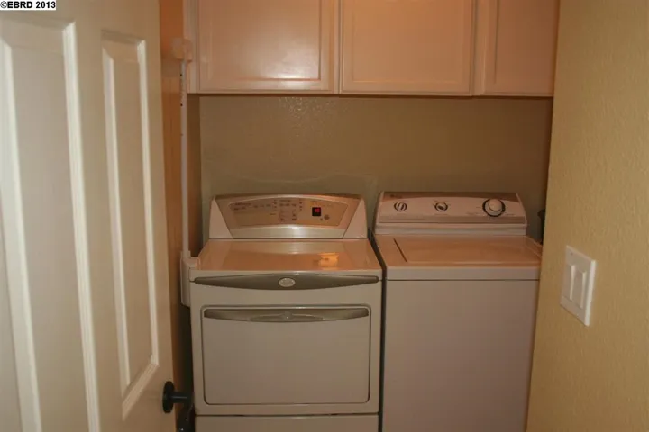 Has cabinets over washer / dryer. Included in sale!