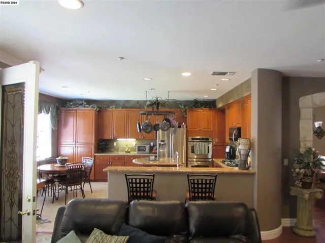 Upgraded glass door (to the left of photo), tons of canned lighting