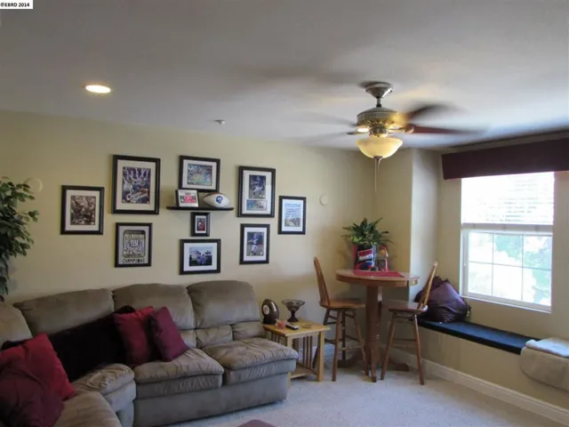 Bonus room has a large window and ceiling fan. Perfect for a game room, movie room, etc.