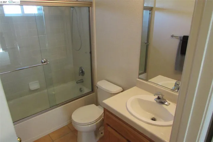 Main bath upstairs has a shower over tub feature.