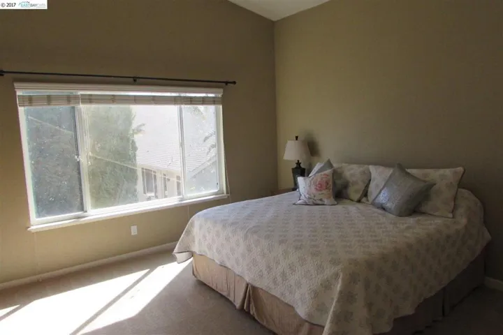 Generously sized, vaulted ceilings, new carpeting.