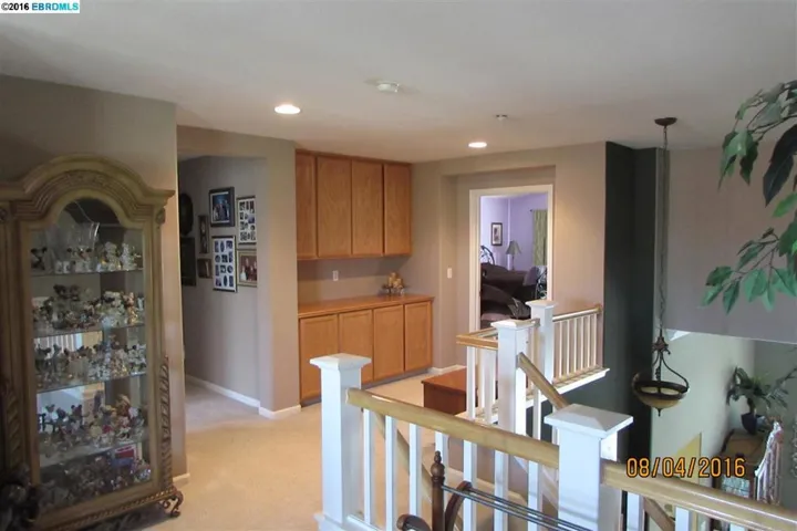 Top of the stairs, looking toward the master and the hall leading to 2 bedrooms and full bath.
