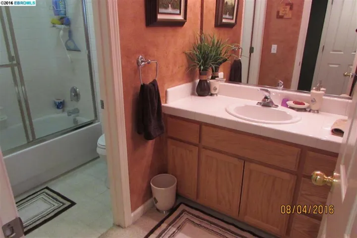 Custom paint, clean and inviting full bath downstairs.